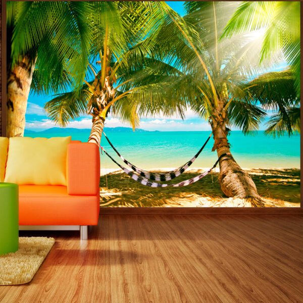 ARTGEIST Fototapet med motiv af hængekøjer i solstråle under palmetræer på strand (flere størrelser) 250x175